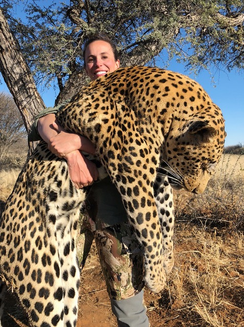 Britt Longoria holding Leopard Trophy